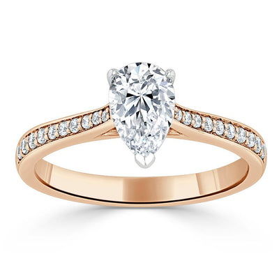 0.75 CT Pear Cut Solitaire Engagement Ring With Channel Pave Setting